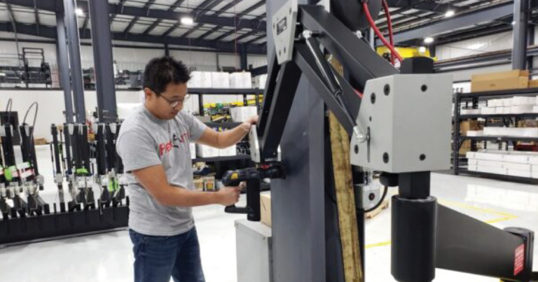 Torque Reaction Arm holding Atlas Copco tool